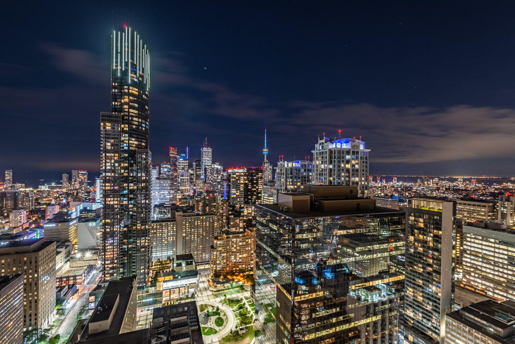 Night view of Toronto skyline from 15 Grenville St balcony.