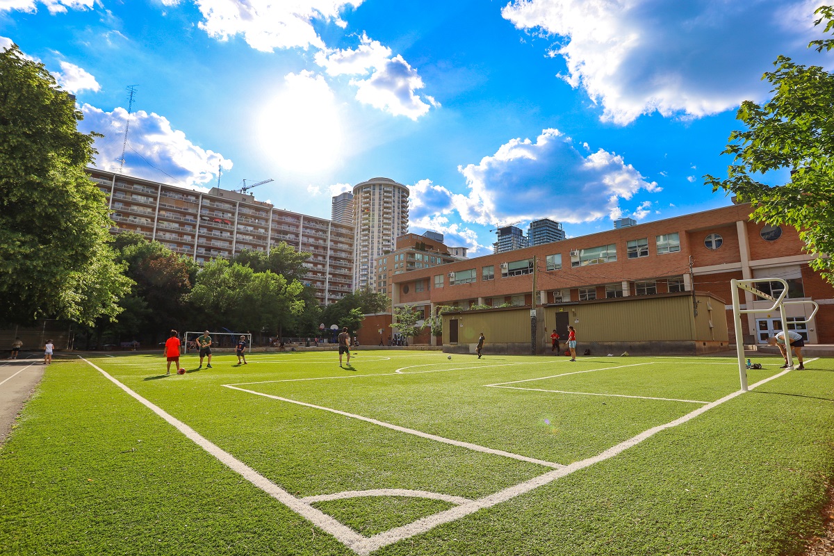 Park near 403 Church St with soccer field and greenery.