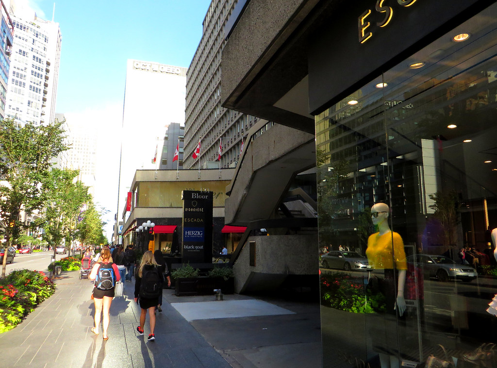 Streets and display windows with fashionable mannequins along Mink Mink in Yorkville, Toronto.