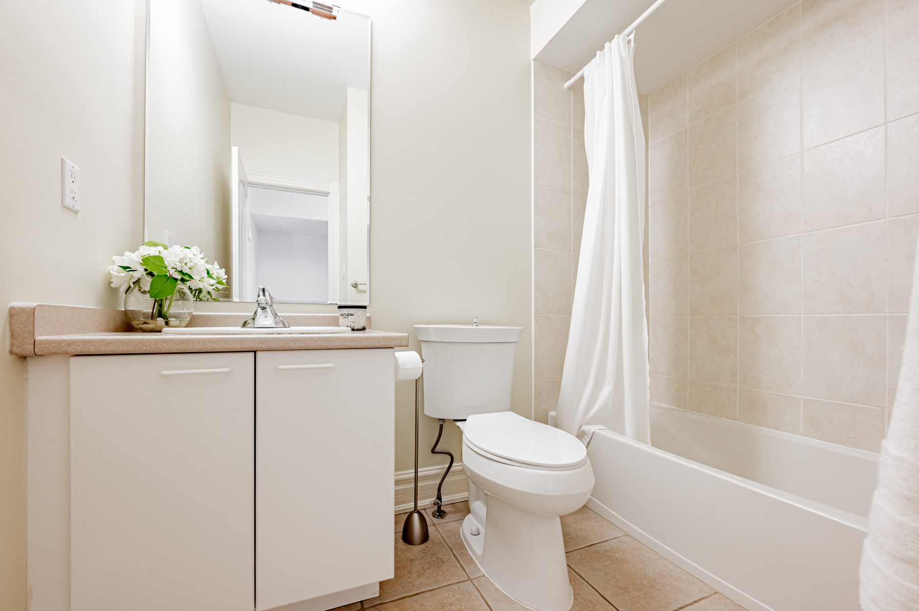 4 piece bathroom with tub, shower and vanity.