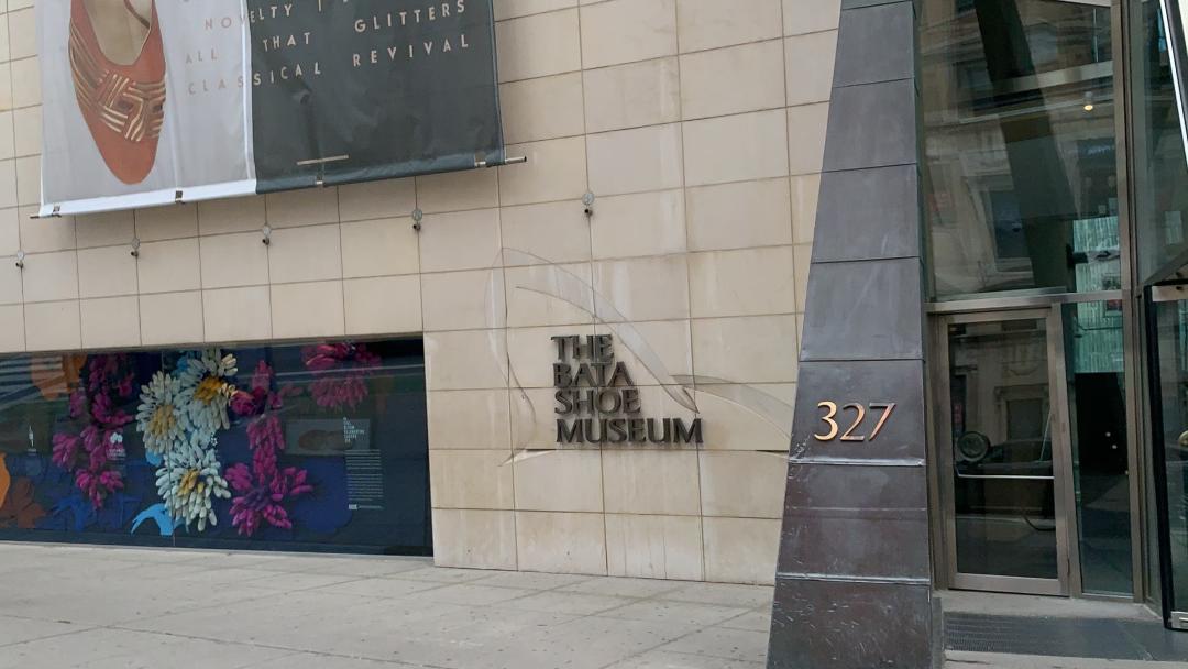 Bata Shoe Museum sign, entrance and banners on Bloor West in The Annex neighbourhood.