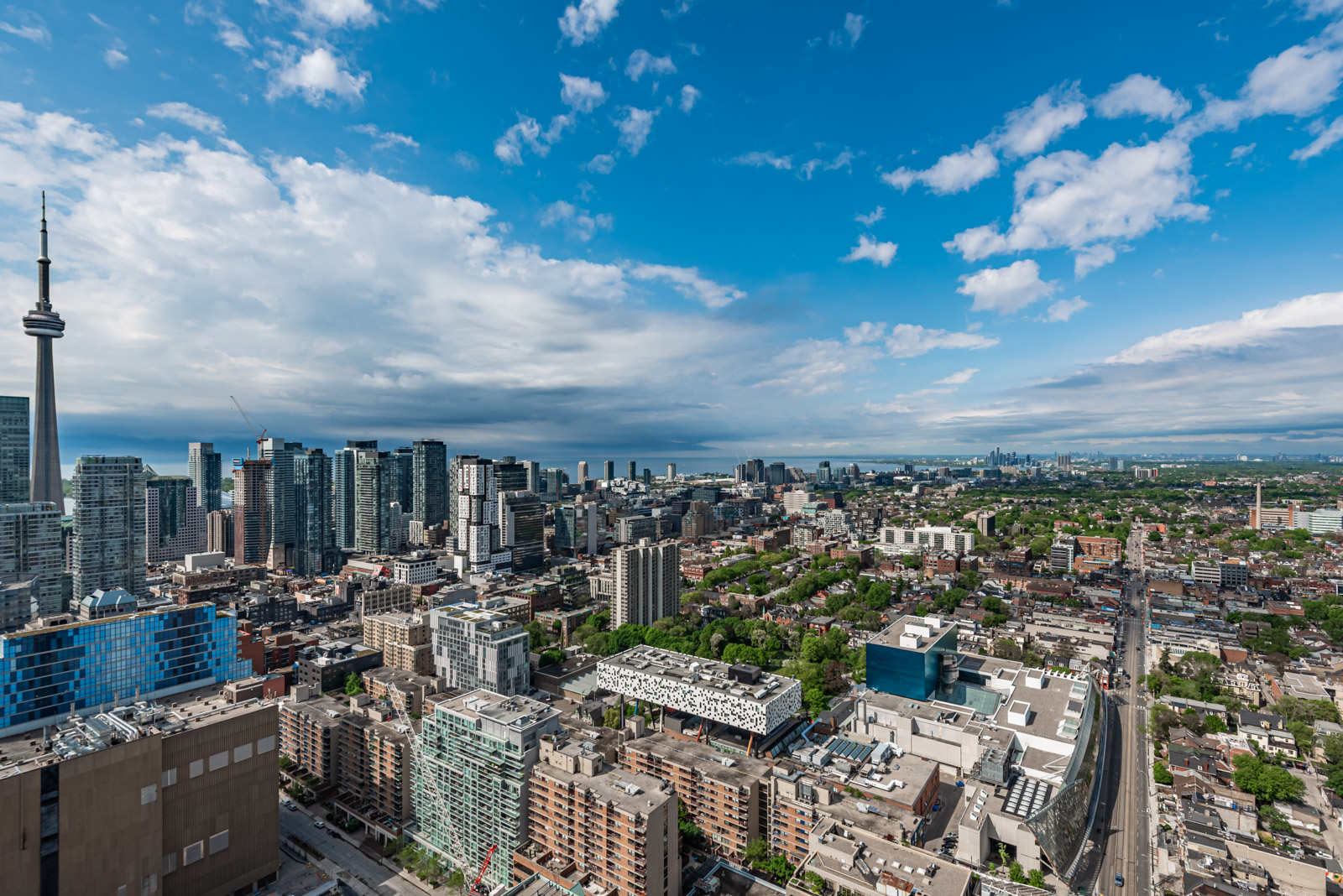 Daytime view of CN Tower, OCAD and Lake Ontario from 488 University Ave Unit 3410 balcony.