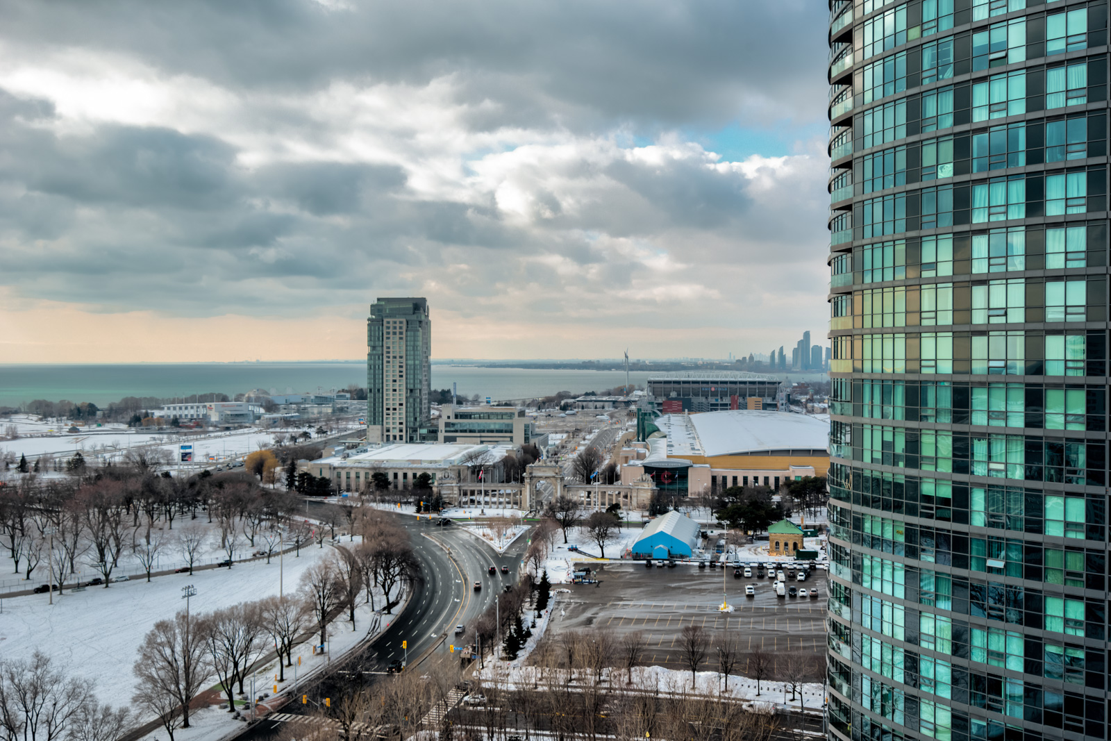 Daytime view of Lake Ontario and buildings from 215 Fort York Blvd balcony.