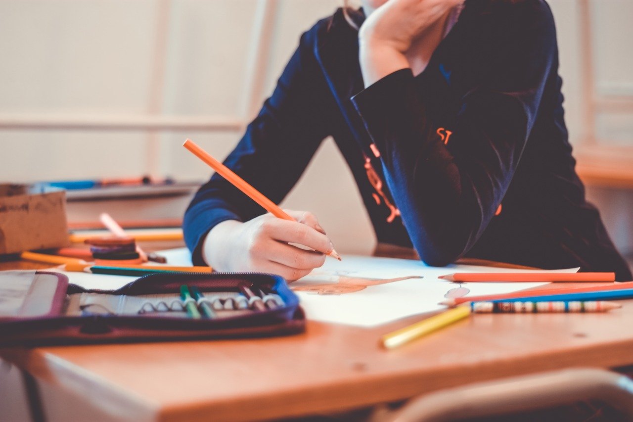 Classroom with student writing.