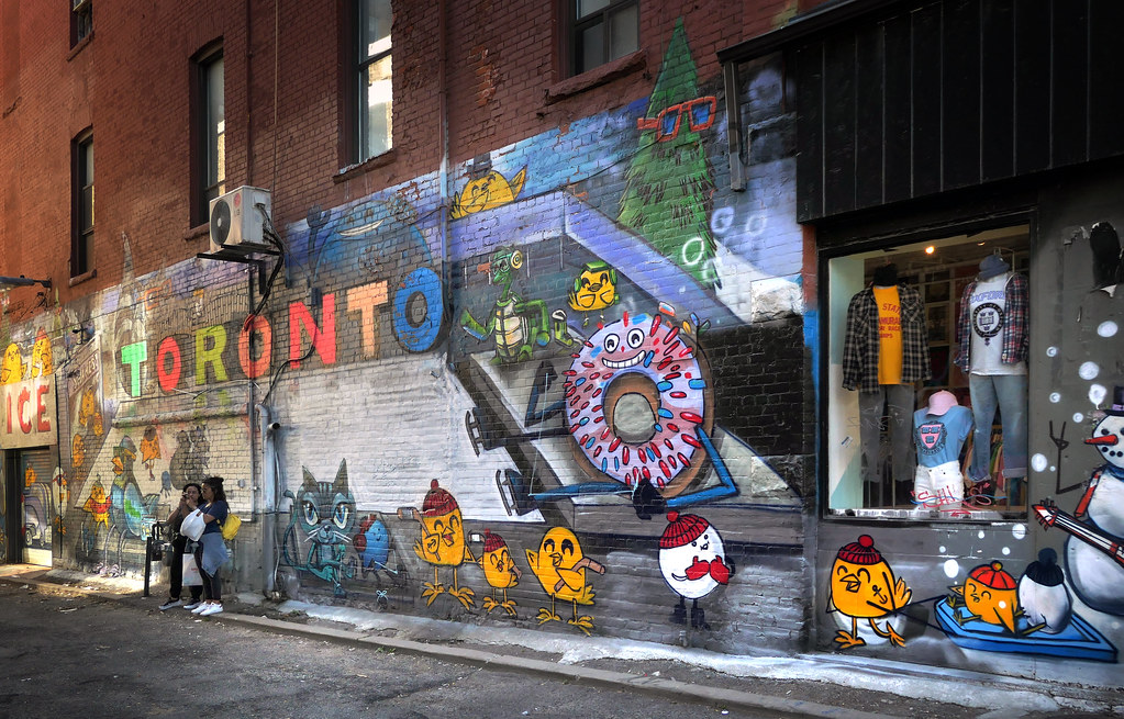 Graffiti of cute birds and animals in Graffiti Alley, Toronto.