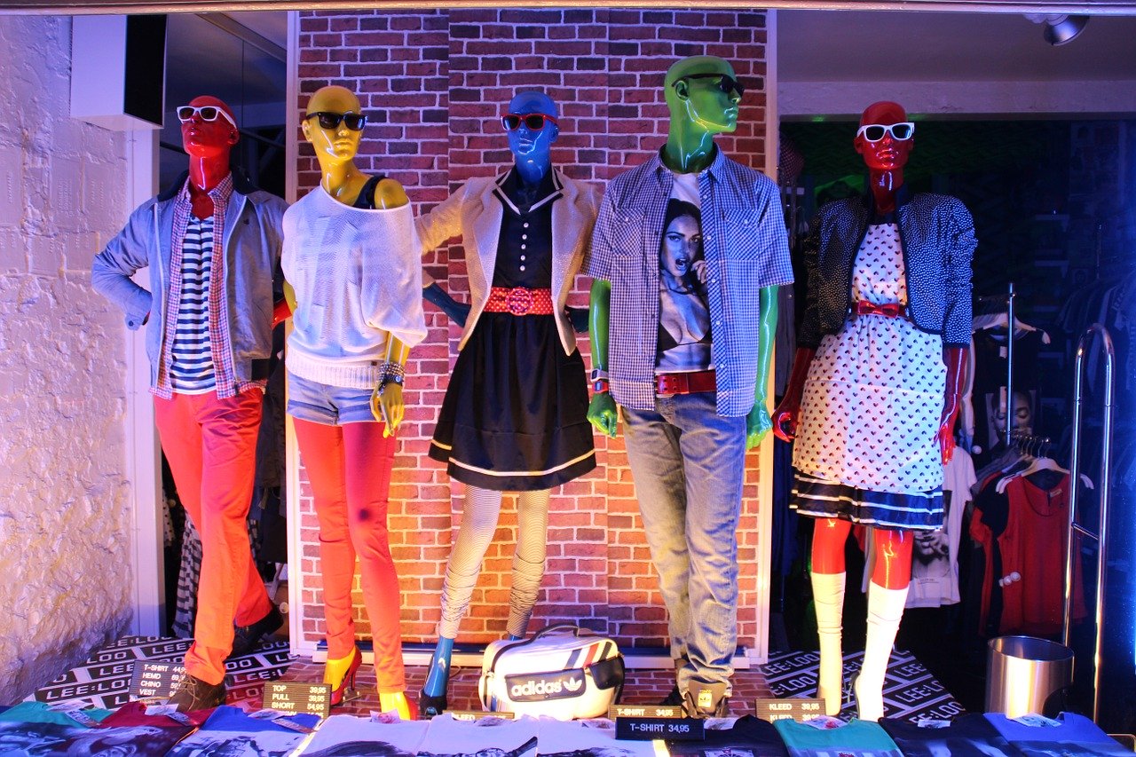 Display window with colourful mannequins.