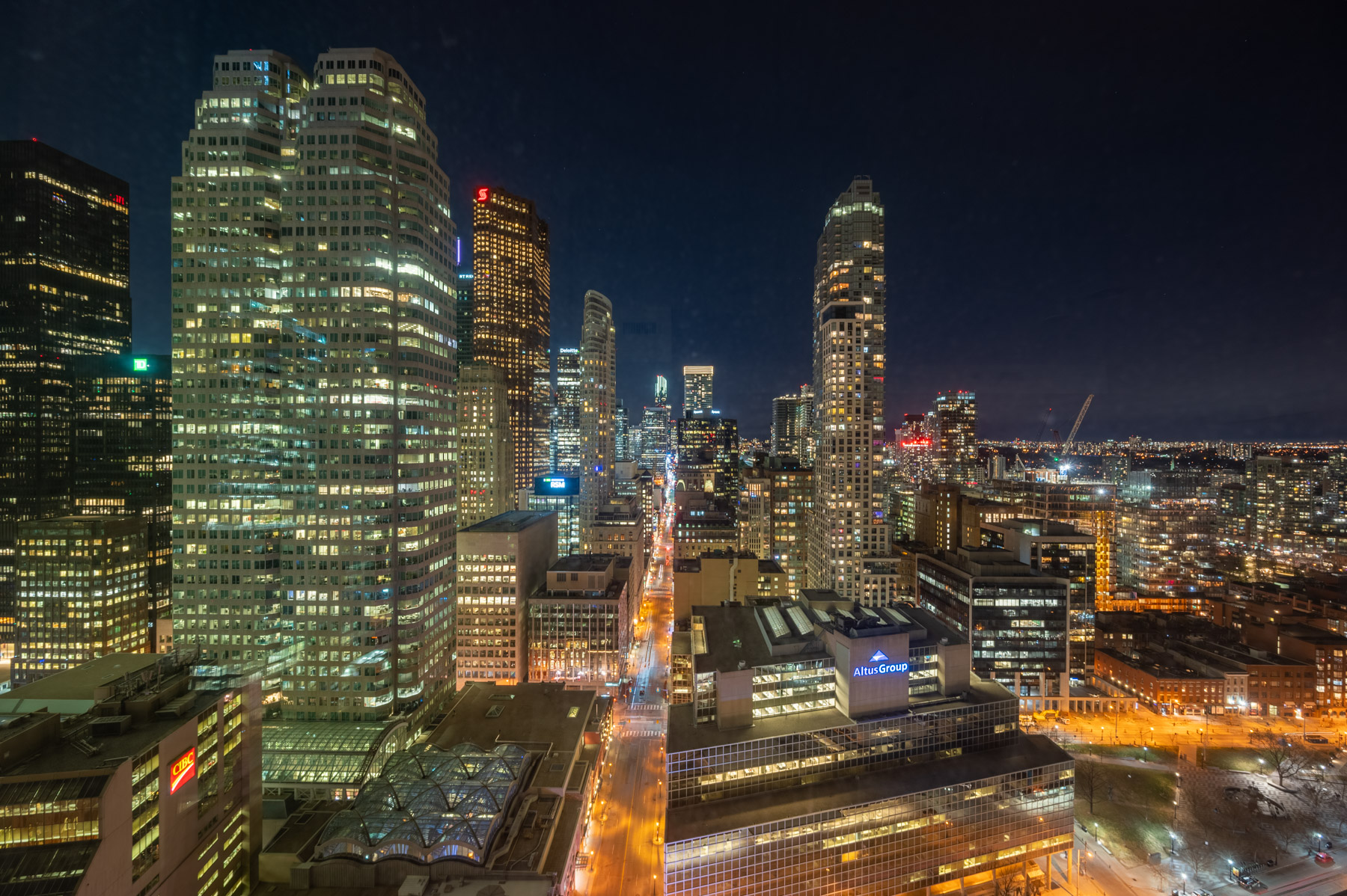 View of Toronto at night from 8 The Esplanade Ave Unit 3305 balcony.