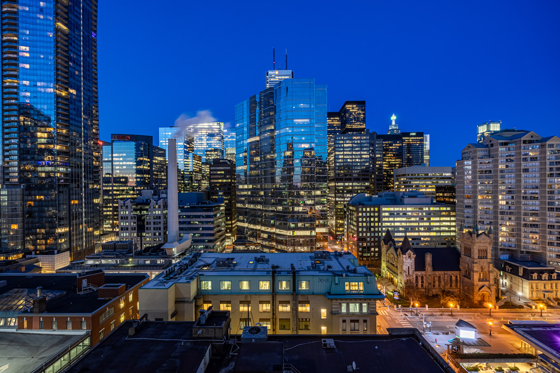 Toronto at night seen from condo balcony.