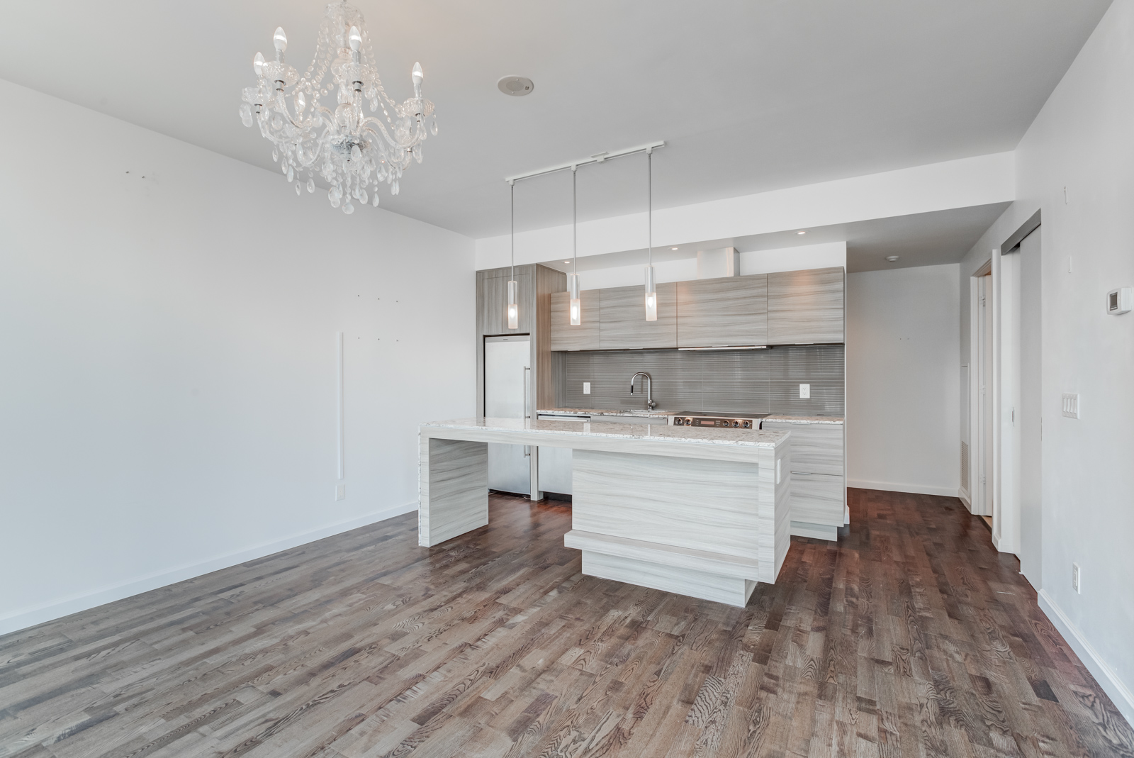 8 Charlotte St Toronto Unit 1508 open-concept living and dining room with kitchen.