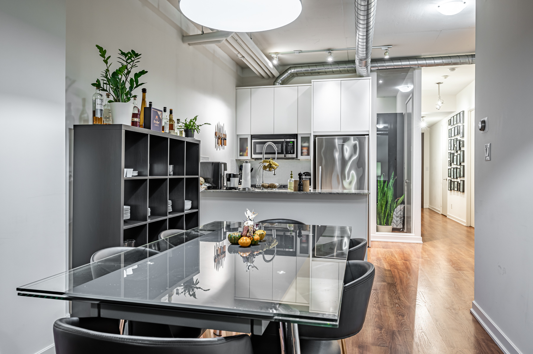 Modern-industrial style dining room and kitchen - 380 Macpherson Ave Unit 517.