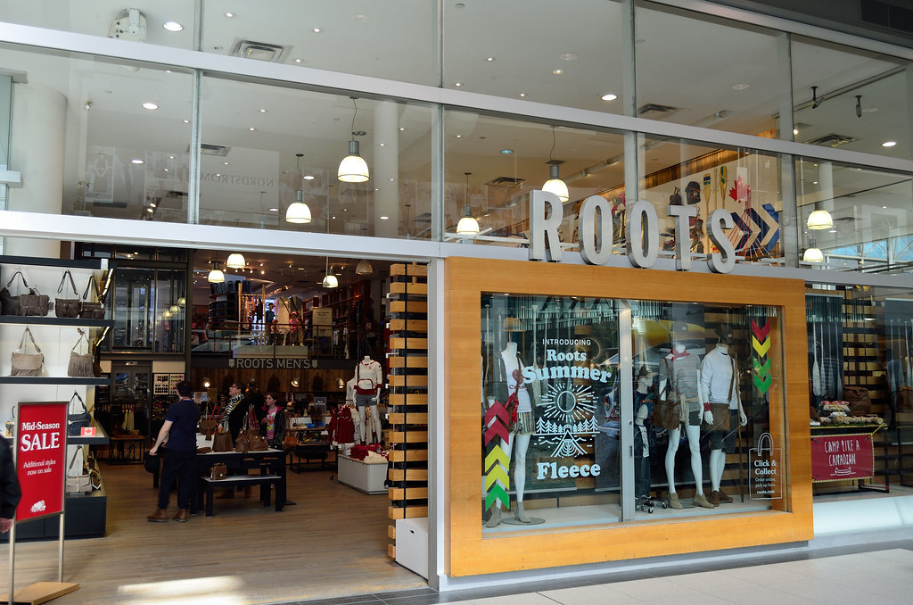 Mannequins in display window of Roots store in Eaton Centre, Toronto.