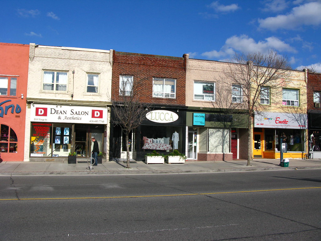 Small business storefronts along Yonge and Eglinton in Toronto.