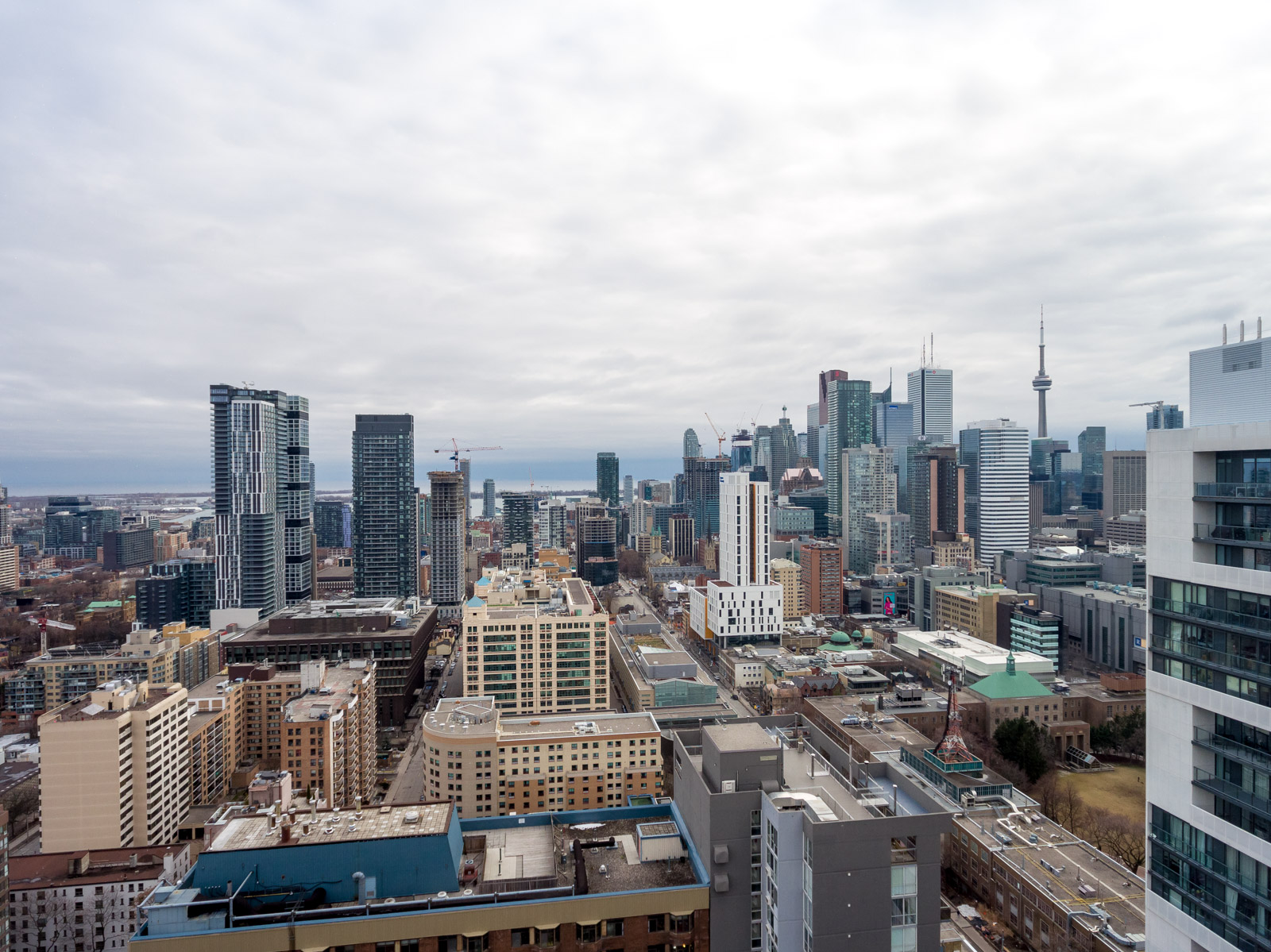 Ariel photo of Church-Yonge Corridor Toronto with CN Tower in distance.