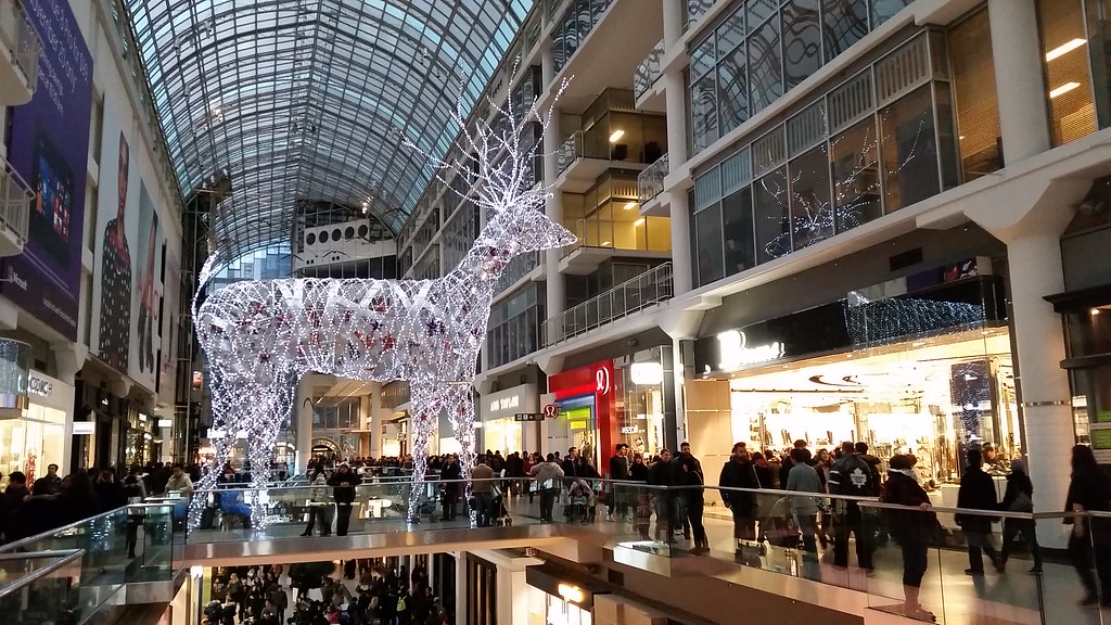Toronto Eaton Centre during Christmas with giant crystal reindeer display.