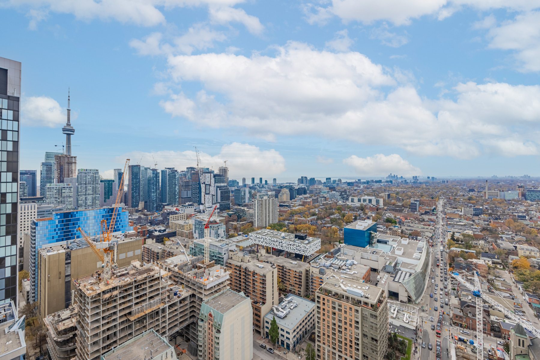 Aerial view of Toronto and suburbs from condo balcony.