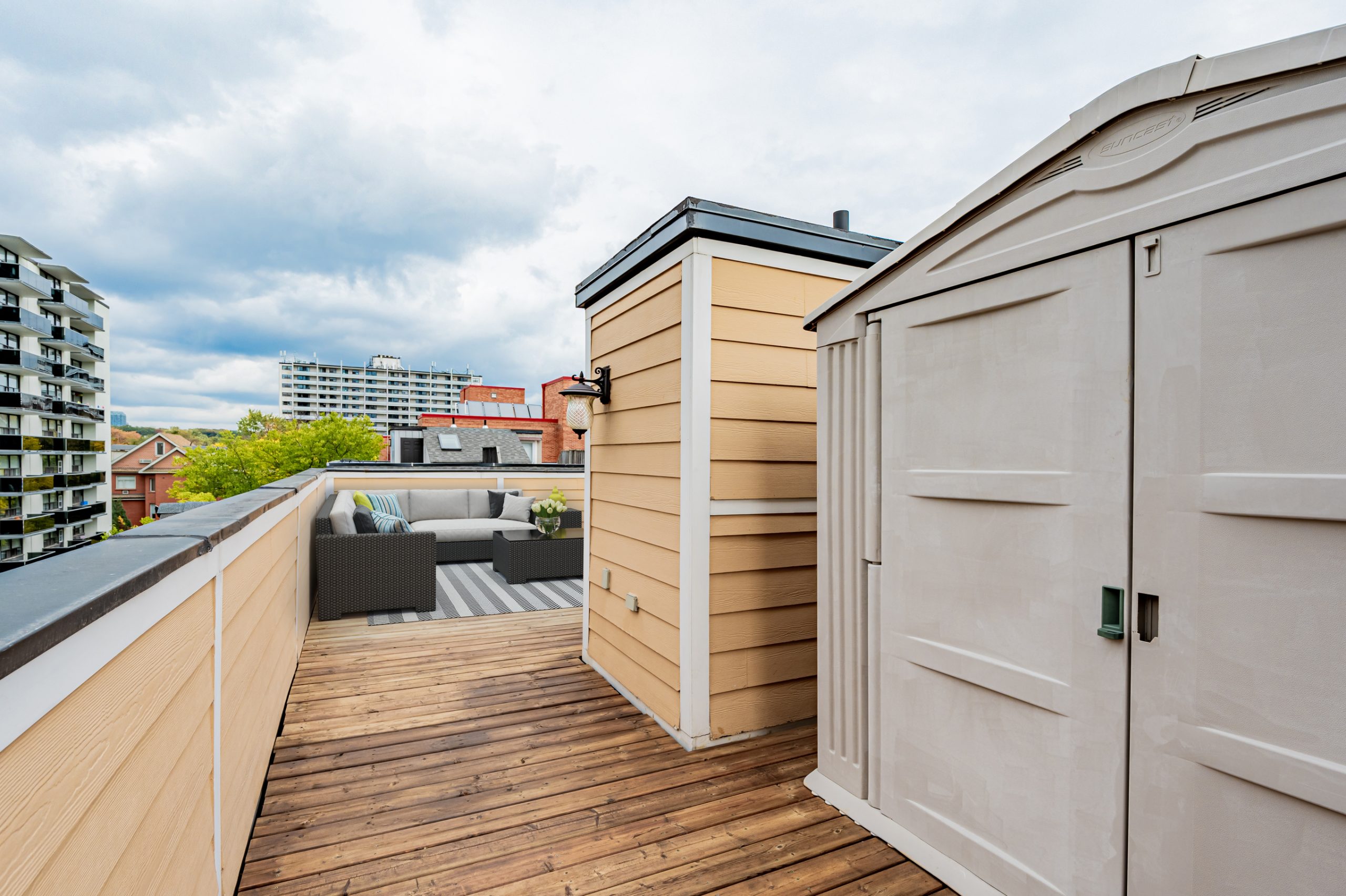 Rooftop terrace with garden shed.