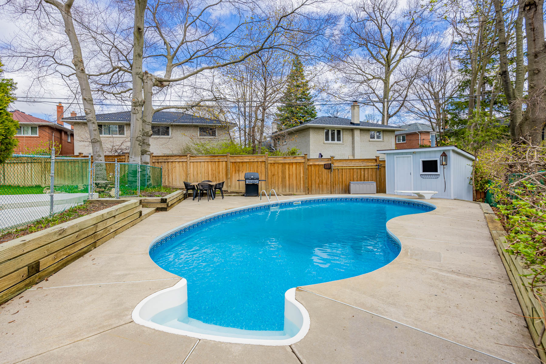 40-foot in-ground swimming pool in house's backyard.