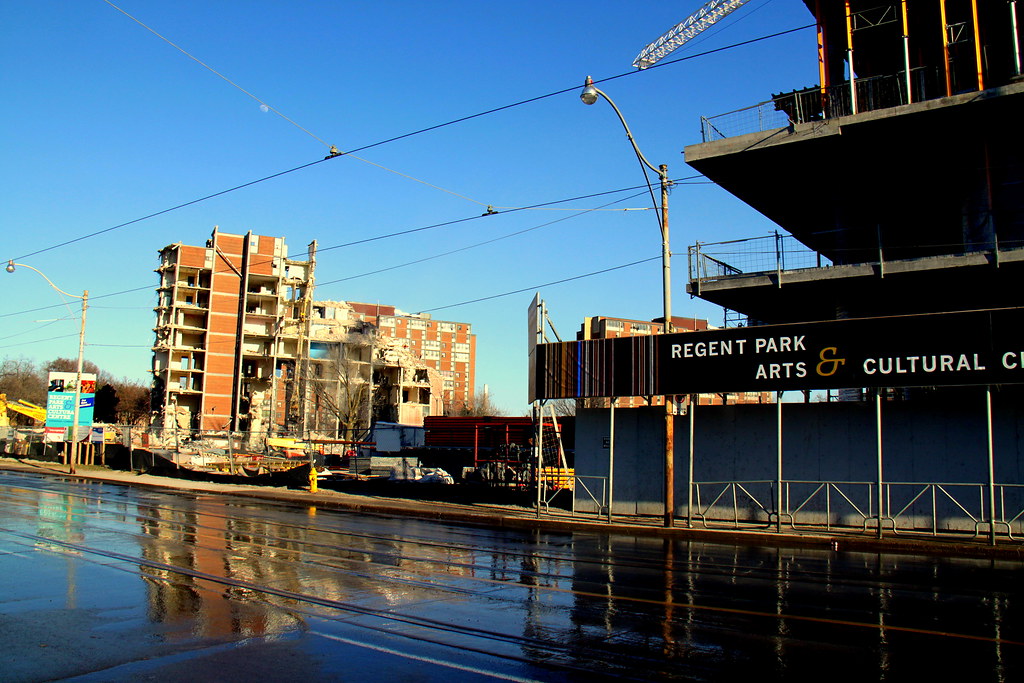 Construction cranes building new arts centre in Toronto's Regent Park neighbourhood.