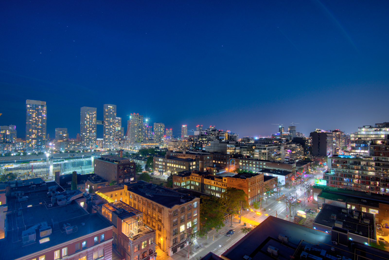 Night view of King St W from roof of Victory Lofts Penthouse Suite in 478 King St W Toronto.