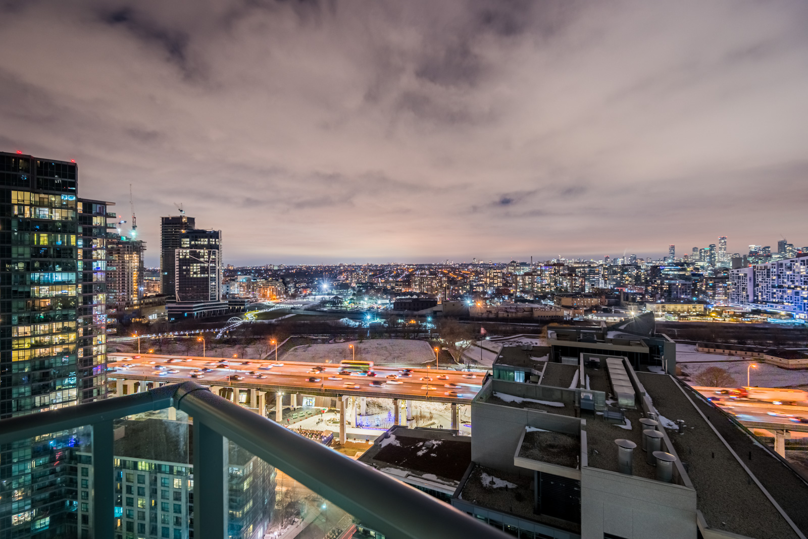 City lights of Fort York, Toronto at night from 215 Fort York Blvd Unit 2310 balcony.