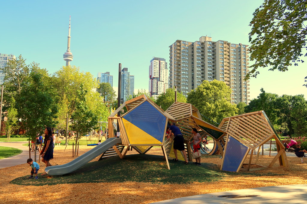Kids playing at new playground of Grange Park, Toronto.