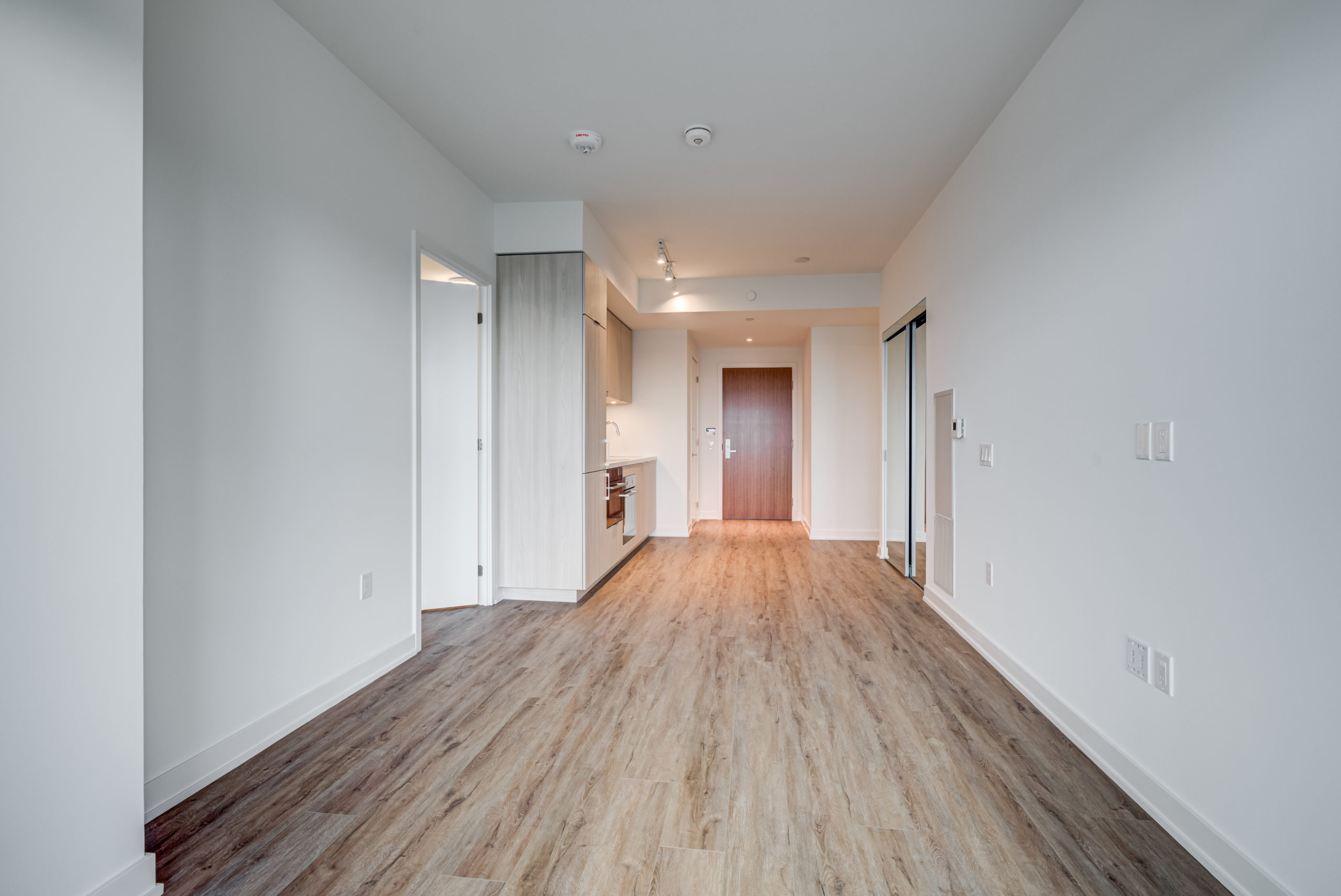 Laminate floors in living and dining rooms of 15 Queens Quay E Unit 1901.