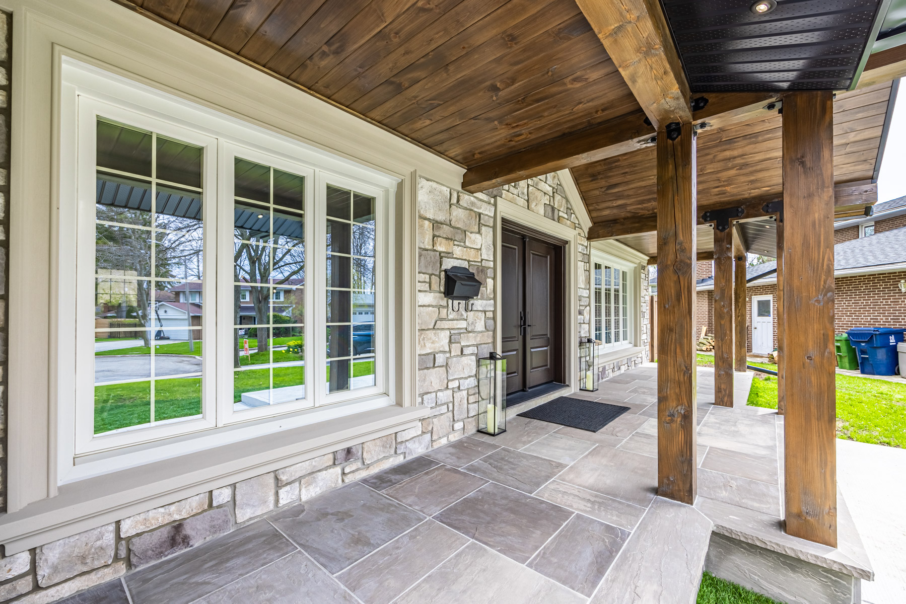 House with large casement windows with white frames.