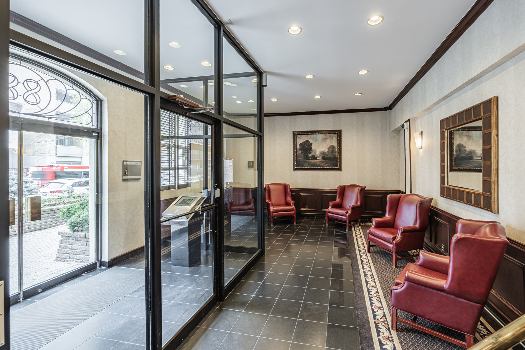 Waldorf Astoria lobby with red-leather armchairs.