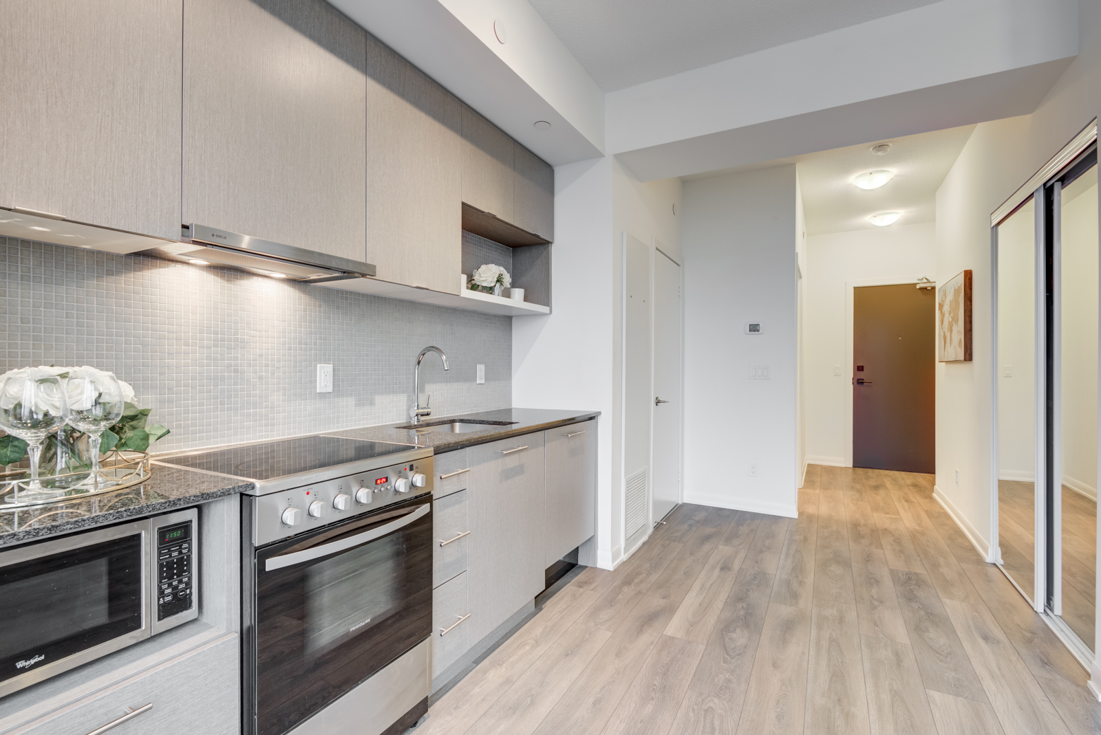 The penthouse suite with linear kitchen in 435 Richmond St W PH 101.