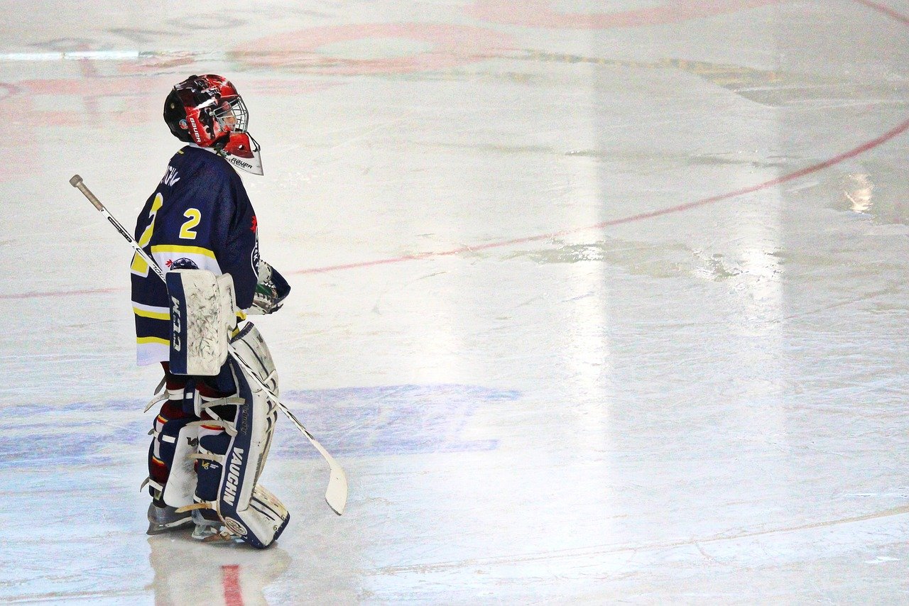 Kid in hockey gear