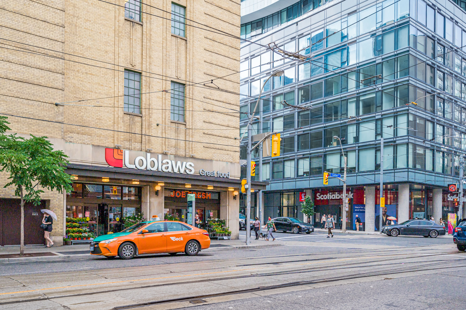 Across the street photo of Loblaws and Scotiabank exteriors.