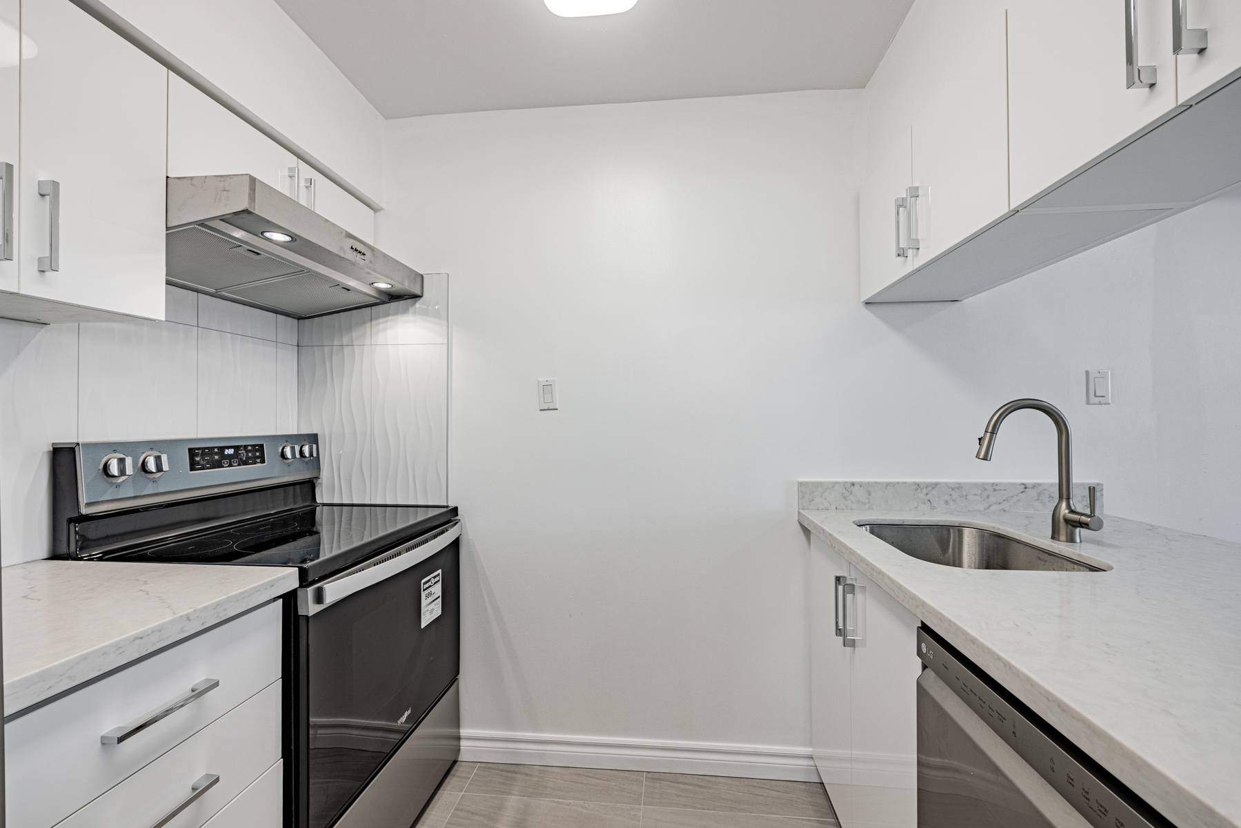 Renovated condo kitchen – 120 St Patrick Street Unit 807.