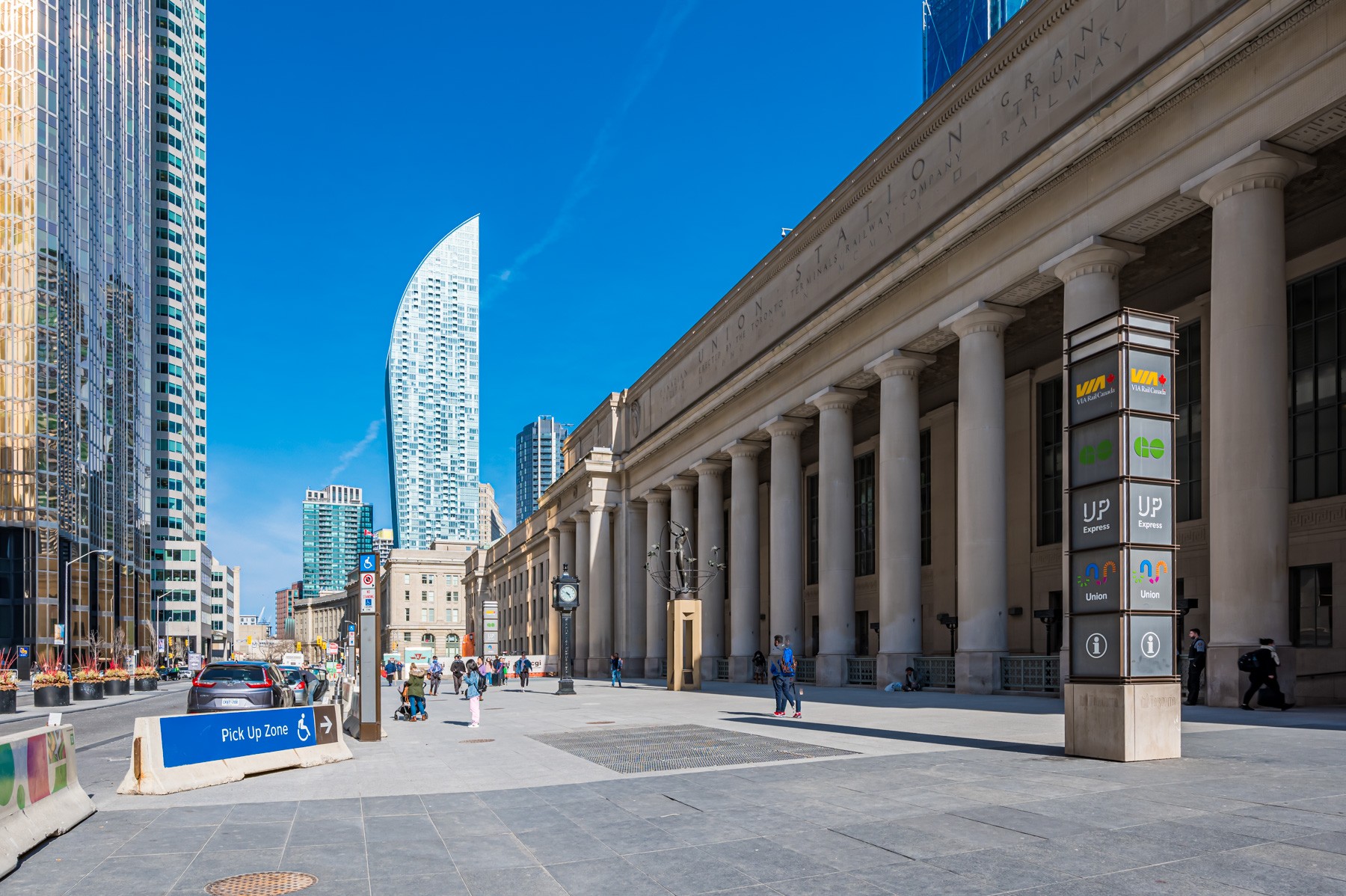 Exterior of Union Station Toronto with L Condos in background.