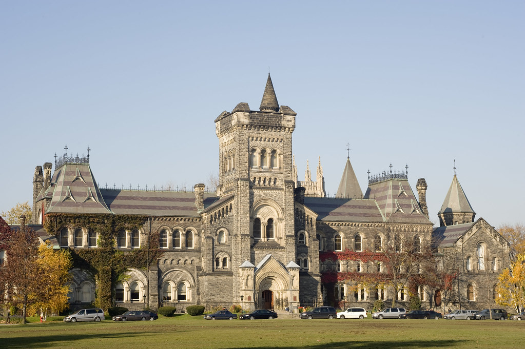 37. University of Toronto gothic architecture lawn afternoon