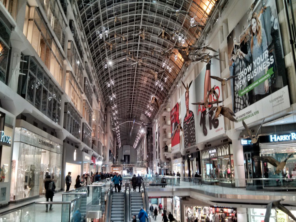 Shops and people in Eaton Centre, Toronto.