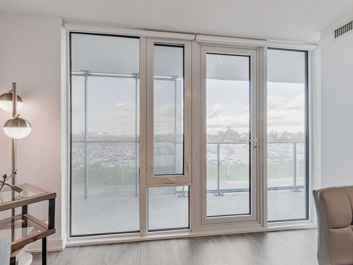 Condo balcony windows with shades.