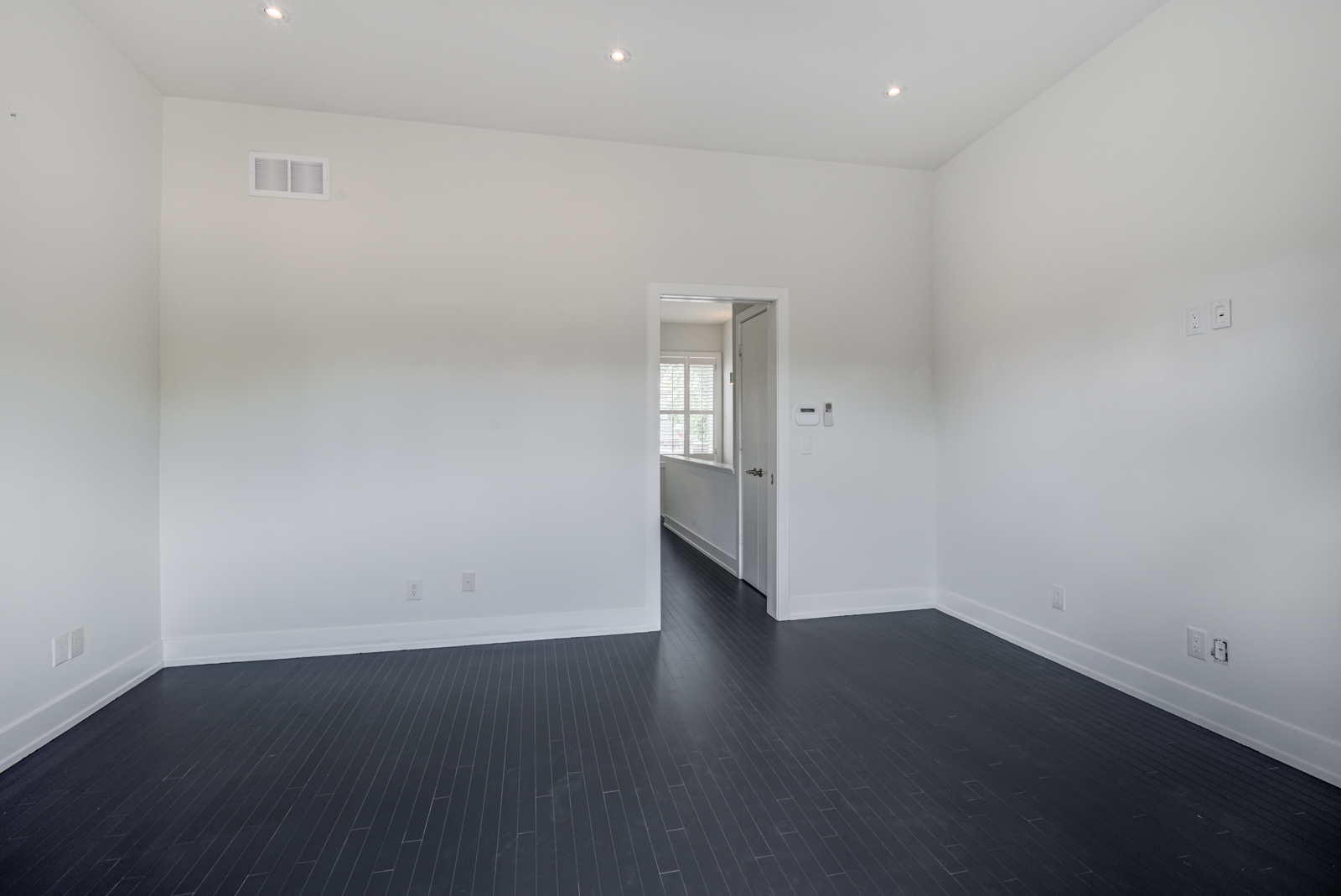 Huge empty master bedroom of 12A Cecil St