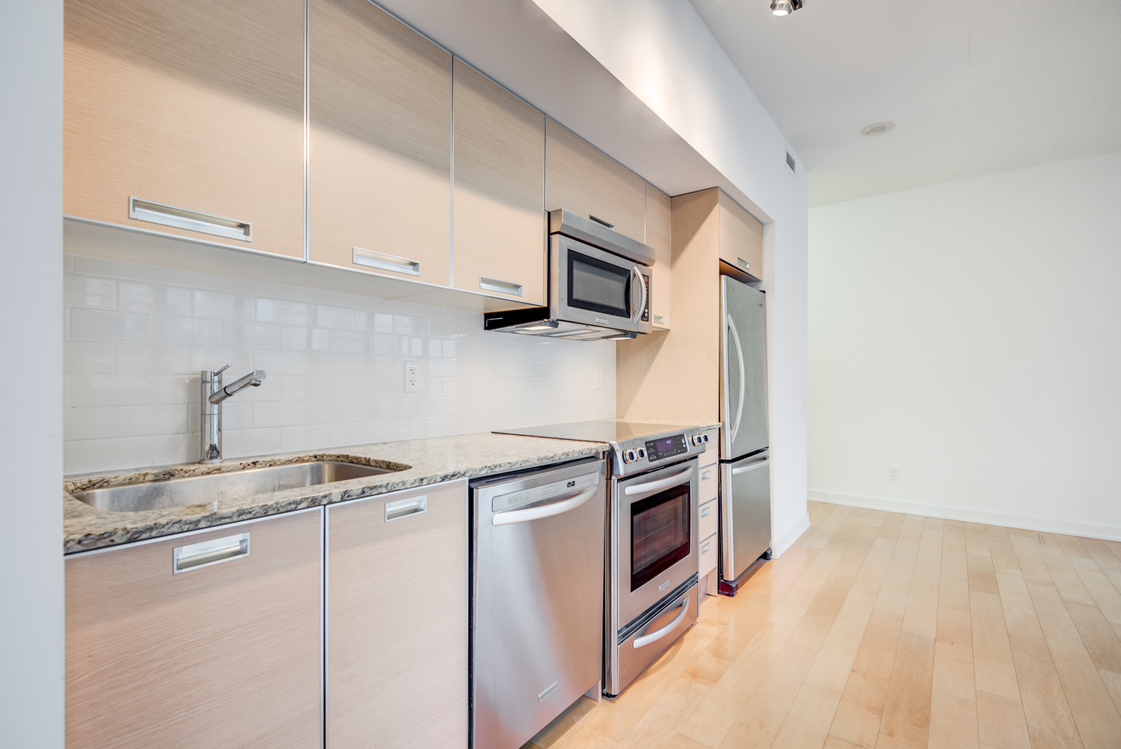 Another kitchen photo; close-up of cabinets and appliances.