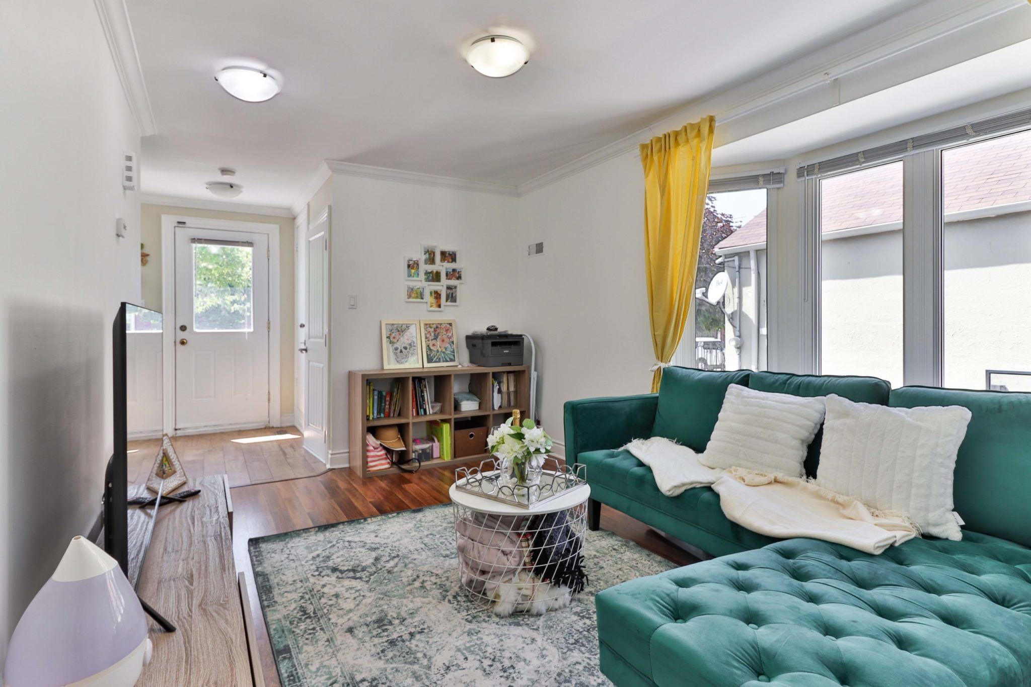 Newly-renovated living room and foyer of 117 Phillip Ave.