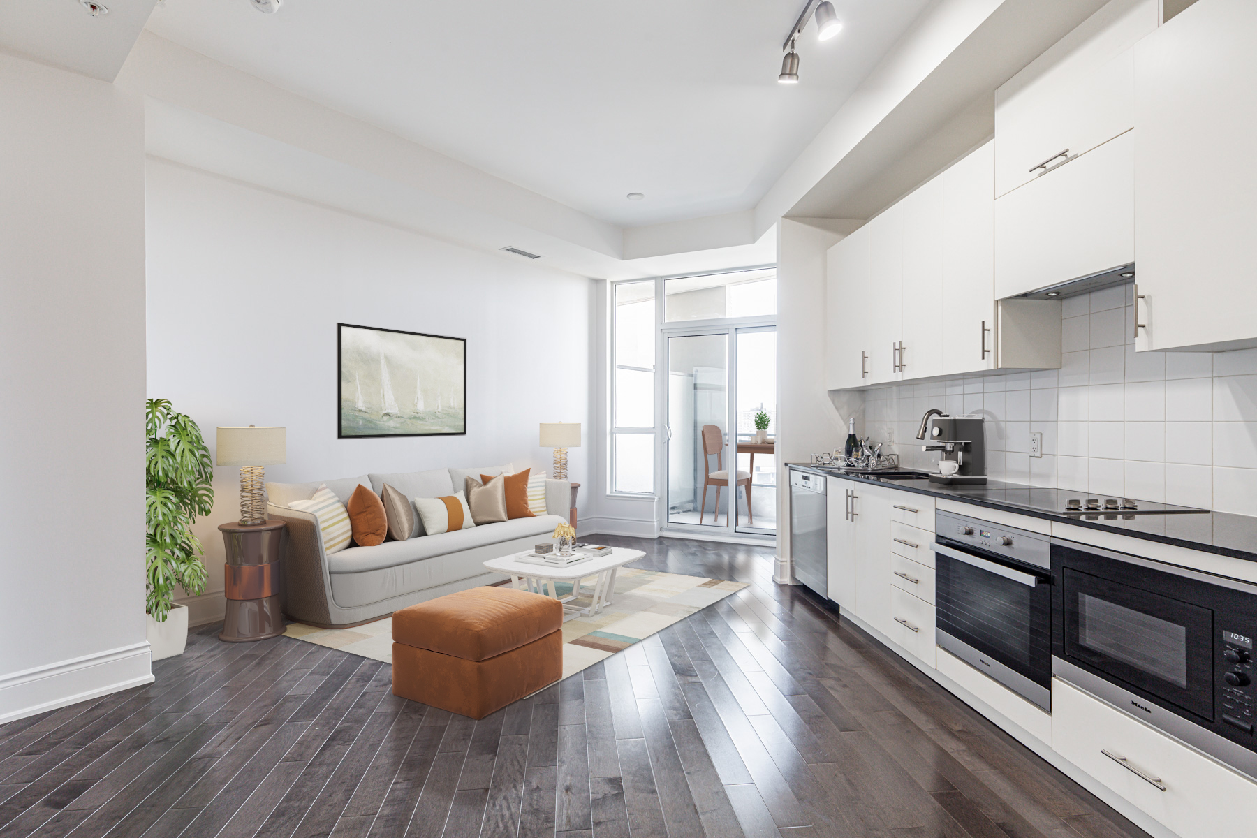 Condo kitchen and living room.