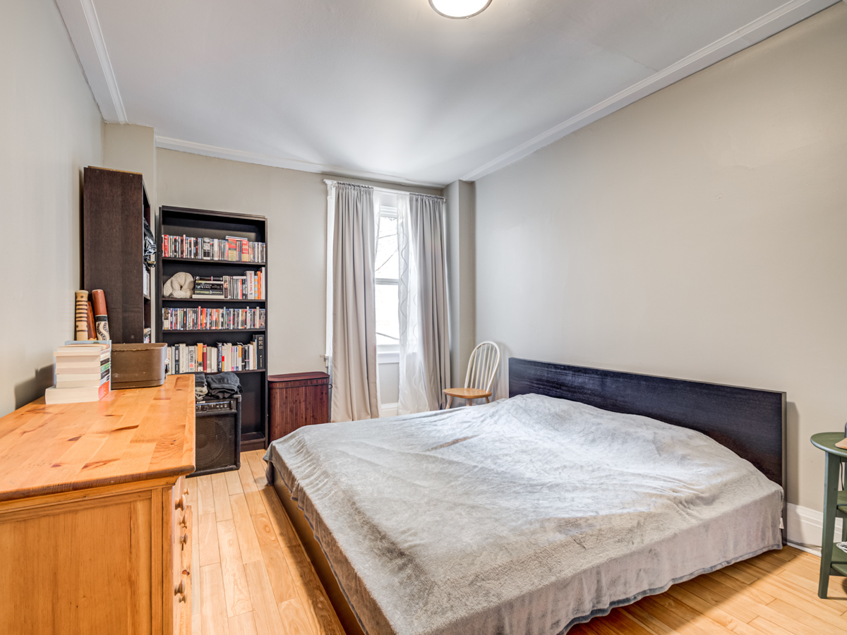 51 Rusholme Park Crescent bedroom with hardwood floors and large windows.