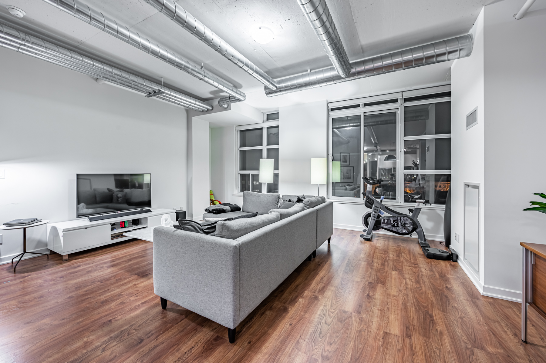 Loft living room with tall ceilings.