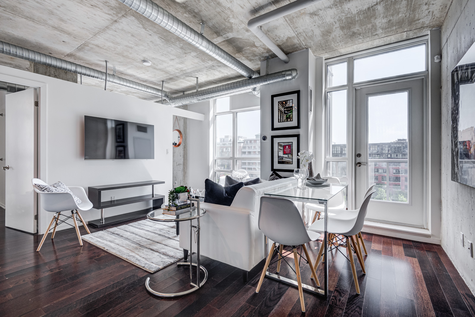 Open-concept living and dining room of 150 Sudbury St 511.
