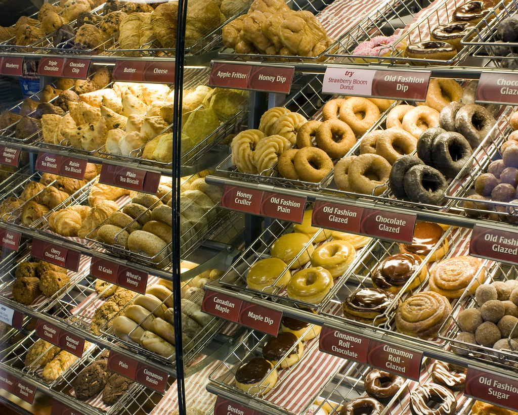 Tim Horton's display with donuts, biscuits and other pastries.