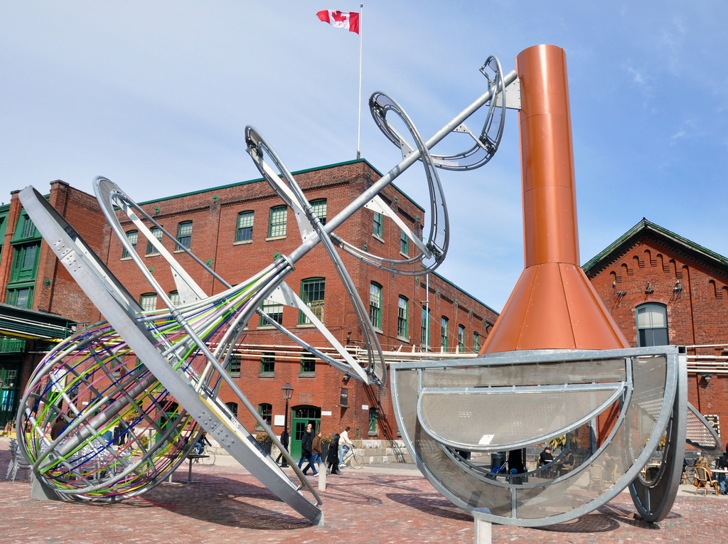 Pic of Toronto's Distillery District. We can see a rather large public artwork.