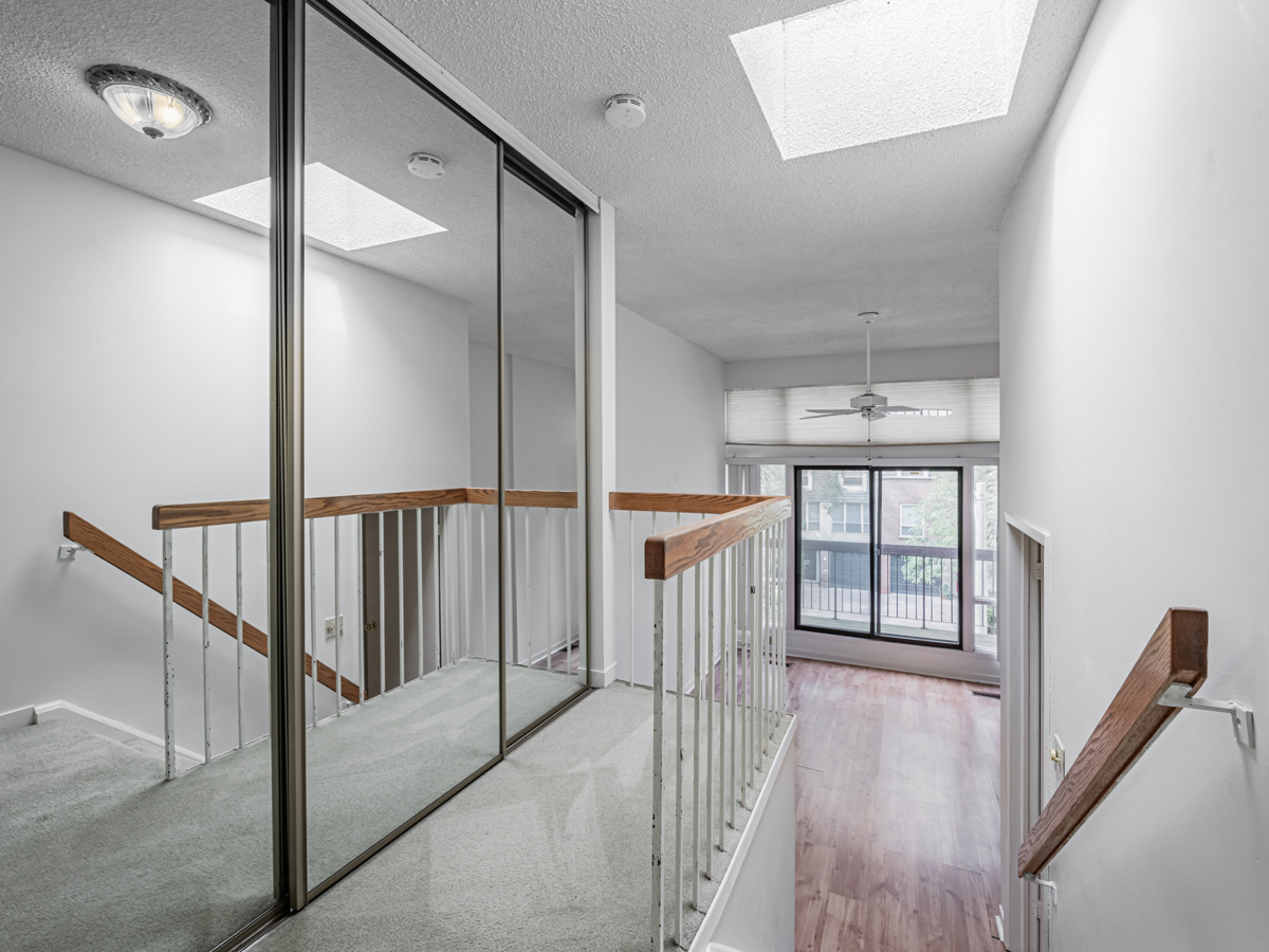 49 Granby St skylight, ceiling fan and mirror door closet.