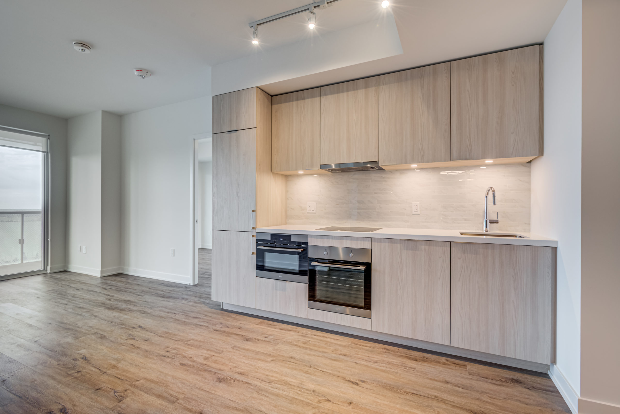 15 Queens Quay E Unit 1901's linear kitchen.