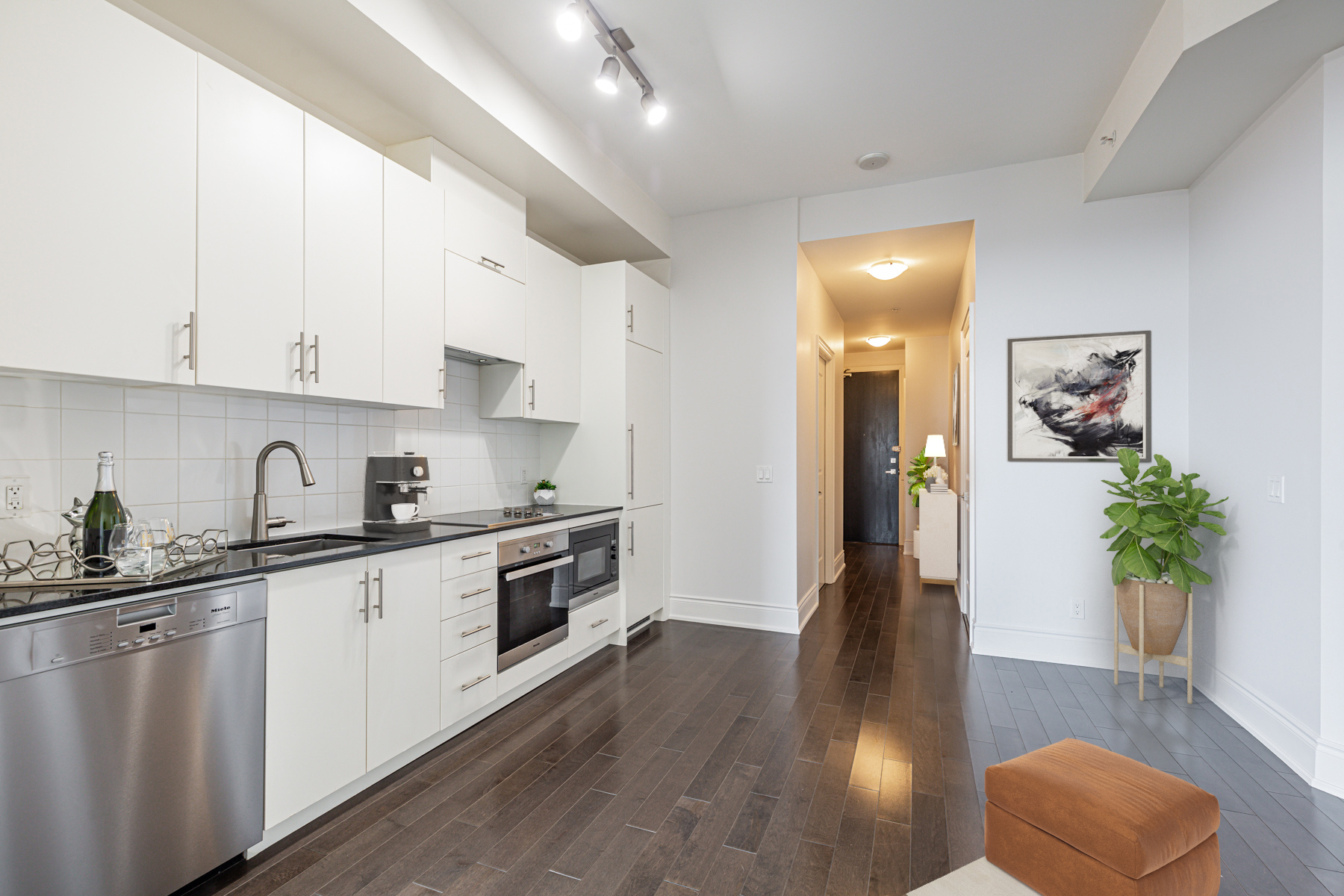 Dark hardwood floors with vertical planks.