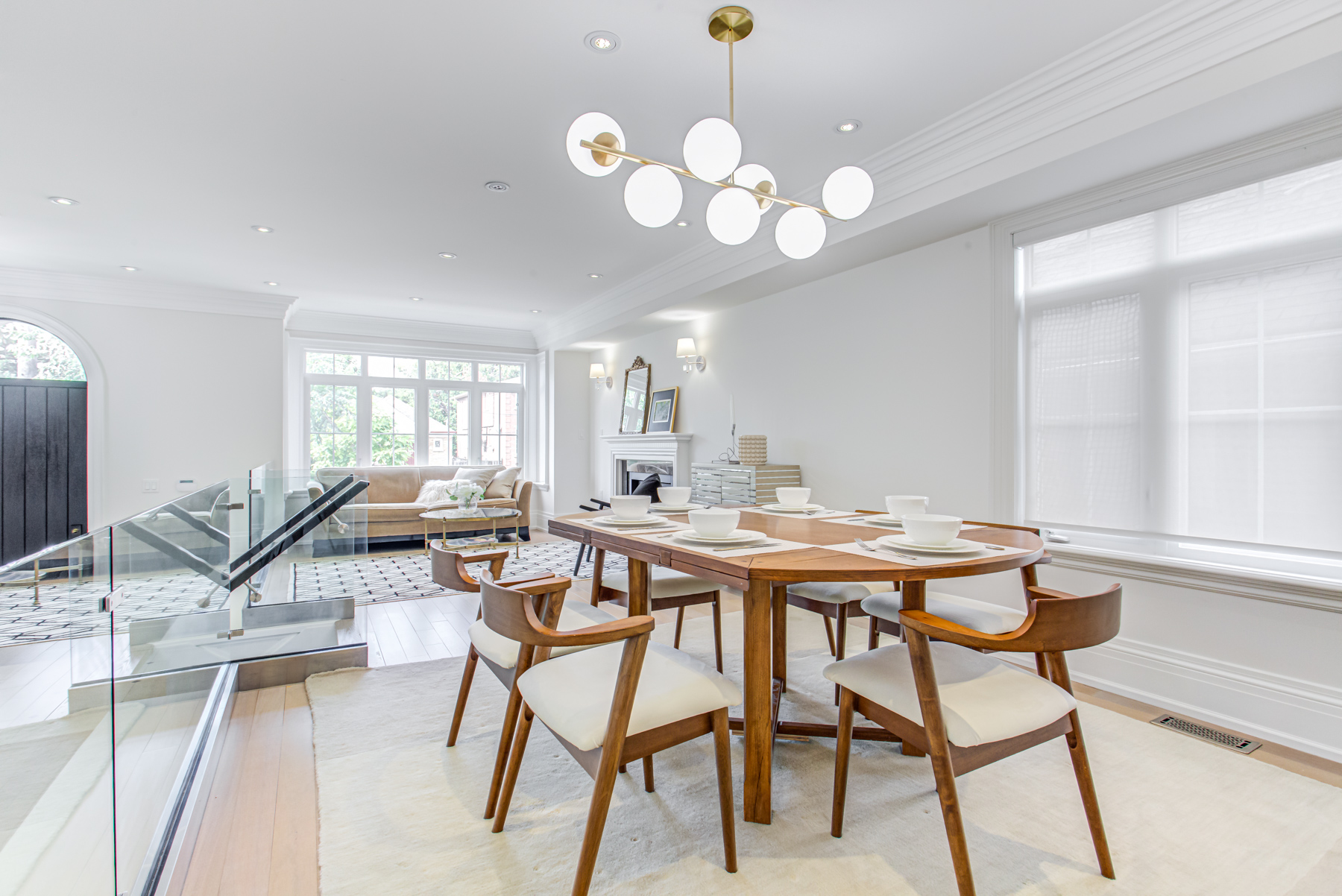 Main floor of 741 Glencairn Ave with high-ceilings, crown molding and potlights.