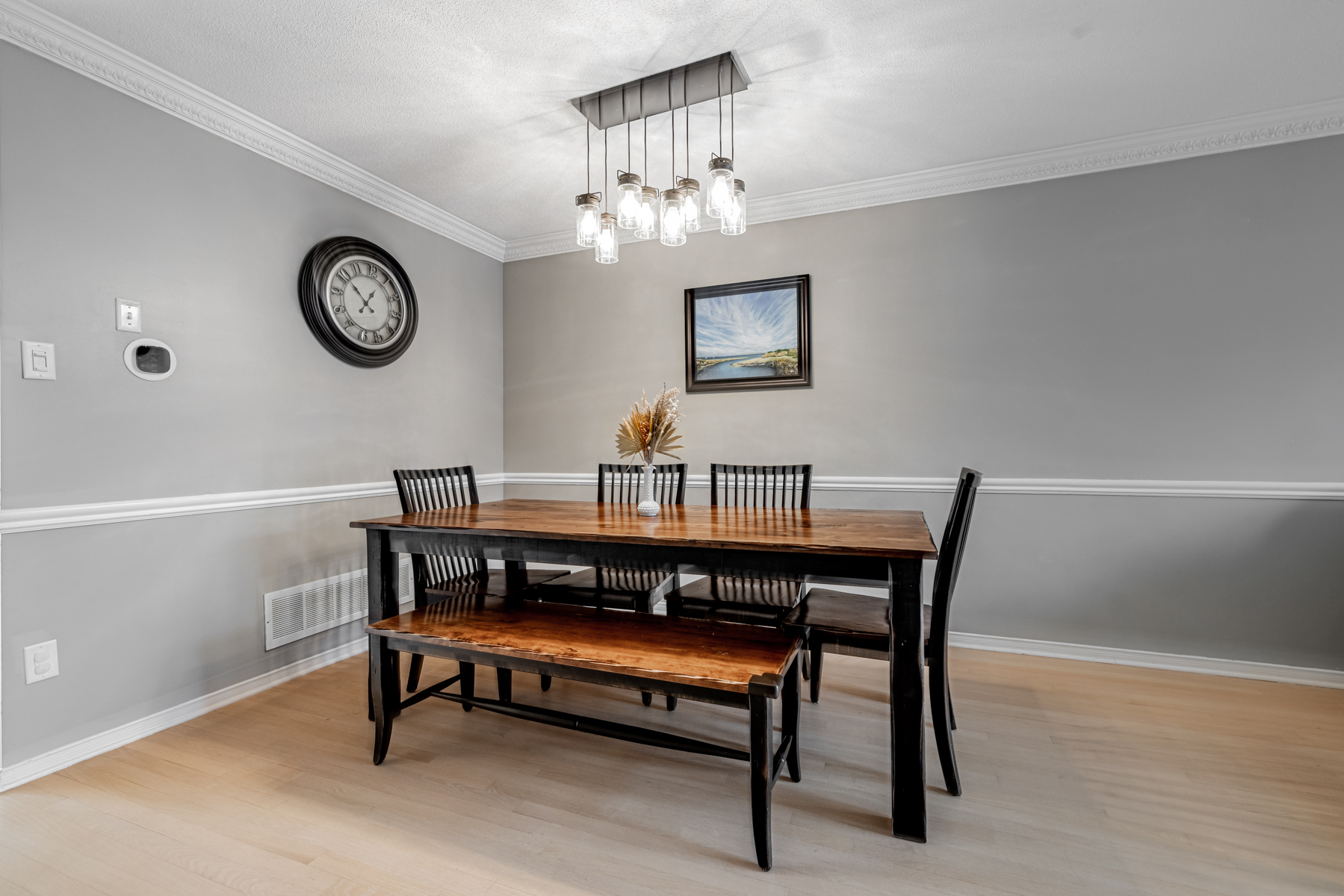 77 Schouten Cres dining room with light-fixture featuring 8 LED light bulbs.